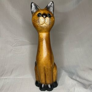 Vintage folk art carved wood cat sculpture.